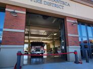 Picture of Fire Station 31 with Fire hose as Ribbon for Ribbon Cutting